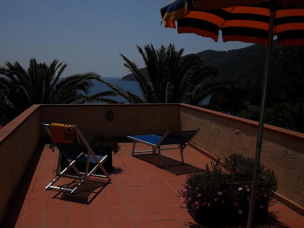 Aparthotel Casa Del Golfo Lacona Pokoj fotografie